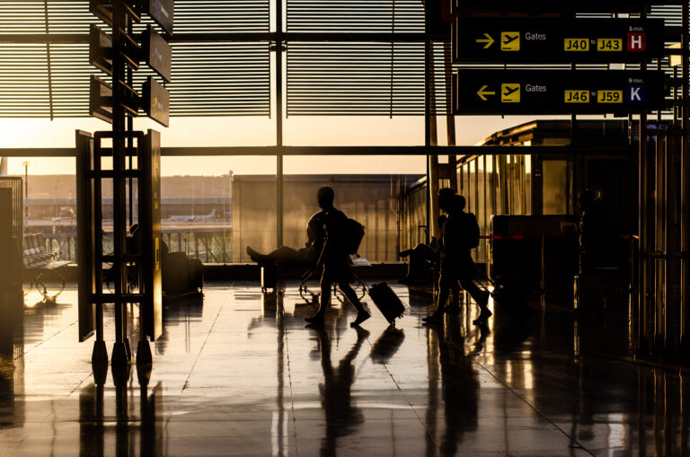 People walking inside a airport terminal